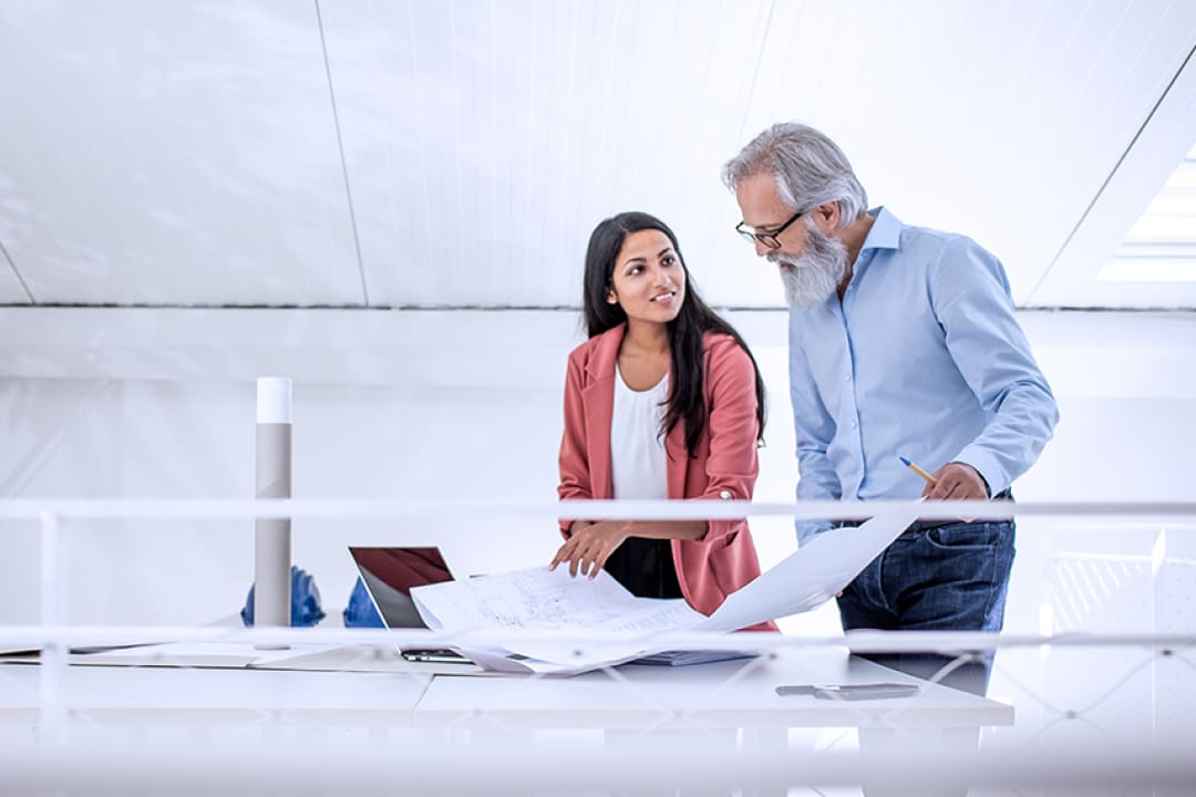 A project manager discussing project plans with a client.